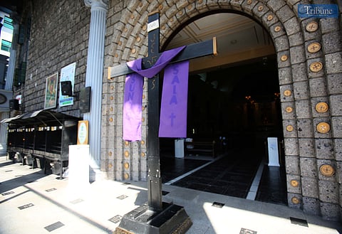 A giant cross is displayed at the entrance of St. Peter Parish Shrine of Leaders as part of a Lenten devotion commemorating Christ’s carrying of the cross and crucifixion during the fifth week of Lent.




