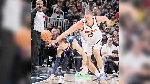 Nikola Jokic barrels his way to his 34th triple double of 26 points, 13 assists and 16 rebounds as the Denver Nuggets slam the Memphis Grizzlies, 117-109, in their NBA regular season game.
