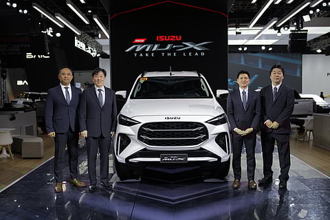 SHOWN are: (from left) Isuzu Philippines Corporation sales division head Robert Carlos, IPC president Mikio Tsukui, IPC executive vice president Yasuhiko Oyama and IPC vice president for Sales Toshihiko Kojima.