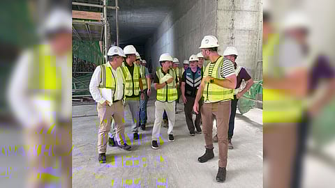 Transportation Secretary Vince Dizon (center) marshals contractors and Department of Transportation officials to accelerate work on the North-South Commuter Railway.