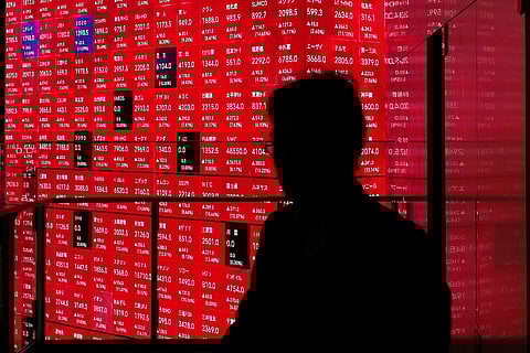 An electronic board shows the Nikkei 225 index on the Tokyo Stock Exchange at an office building in Tokyo on 10 April 2025. Stocks in Asia rebounded strongly on April 10 after US President Donald Trump's stunning reversal on sweeping reciprocal tariffs.

