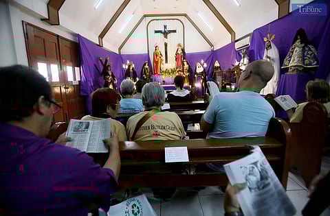 On Holy Tuesday, 15 April 2025, devotees perform the traditional Pabasa — a chanting or singing of the Pasyon, a poetic narrative of the life, suffering, death, and resurrection of Jesus Christ — inside St. Bernadette Chapel at the National Shrine of Our Lady of Lourdes in Quezon City.