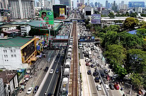Moderate traffic begins to build up along EDSA southbound in Kamuning, Quezon City, on Holy Wednesday, 16 April 2025.