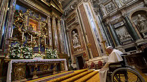 This photo taken and handout on 31 May 2022 by The Vatican Media shows Pope Francis praying by the Byzantine icon of the Virgin Mary and the Christ Child "Salus Populi Romani" as he presides over the Rosary for peace in Ukraine and end to wars worldwide, at the Basilica of St. Mary Major in Rome.