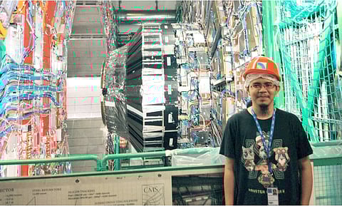 Dr. Marvin Flores at the LHC Detector. 