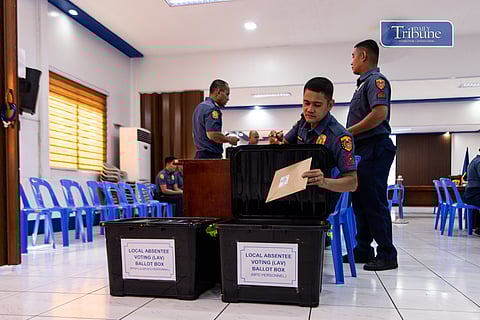 Bataan police personnel cast absentee votes