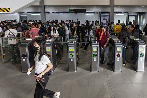 PASSENGERS rush on and off an LRT-1 train at PITX station in Parañaque City on Wednesday, the bustle reflecting the daily grind of commuters navigating Metro Manila’s hectic transit system.