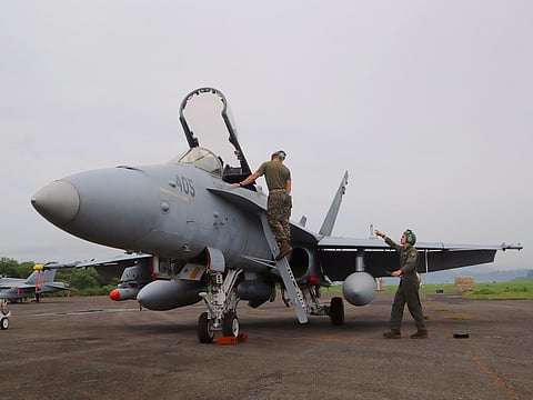 AN F18 Hornet is being maintained at the Subic Bay International Airport during the Balikatan exercises. 
