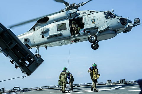 Transfer of cargo Philippine Navy personnel conduct a vertical replenishment operation, highlighting seamless ship-air coordination during the Multilateral Maritime Cooperative Activity on 29 April in the West Philippine Sea.
