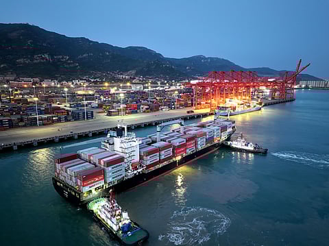 A container ship arrives at Lianyungang port in Lianyungang, in China’s eastern Jiangsu province in the morning on 2 May 2025. China said on 2 May it is evaluating a US offer for negotiations on tariffs but insisted Washington must be ready to scrap levies that have roiled global markets and supply chains before talks can begin.