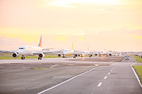 Runway rest  Birds of steel from various airline fleets lie in wait for their assigned moment to take off under the midday sun at the Ninoy Aquino International Airport. 