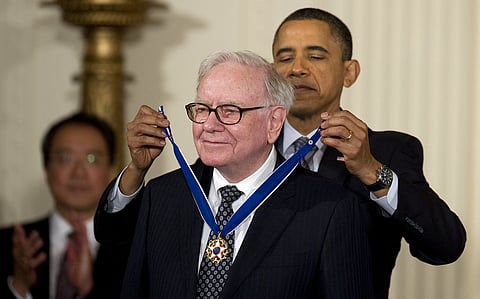 US President Barack Obama presents the 2010 Medal of Freedom to Warren Buffett during a White House ceremony on 15 February 2011. Buffett, who announced on 3 May 2025 that he will retire from leading Berkshire Hathaway by year-end, said Greg Abel would take over as CEO.