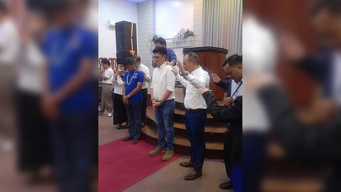 Kaunlad Pinoy first nominee Kuya Choi (third from right) receives a prayer blessing from the United Pentecostal Church at the Philippine Evangelism Center as he seeks for guidance, strength and victory ahead of the midterm polls.
