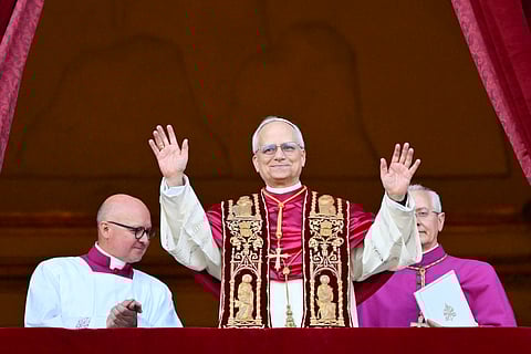 Newly elected Pope Leo XIV, Robert Francis Prevost arrives on the main central loggia balcony of the St Peter's Basilica for the first time, after the cardinals ended the conclave, in The Vatican, on 8 May 2025. Robert Francis Prevost was elected on Thursday, the first pope from the United States, the Vatican announced. A moderate who was close to Pope Francis and spent years as a missionary in Peru, he became the Catholic Church's 267th pontiff, taking the papal name Leo XIV.