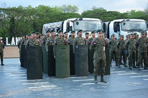 ⁨Civil Disturbance Management (CDM) platoons stand in formation during the mustering of the Headquarters Philippine Army election contingency force in the National Capital Region at the Headquarters Philippine Army Grandstand, Fort Bonifacio, Taguig City. 