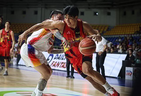 Don Trollano drives his way to 21 points as San Miguel Beer rolled to a 111-92 victory over Phoenix in their PBA Philippine Cup game on Sunday at the Ninoy Aquino Stadium.