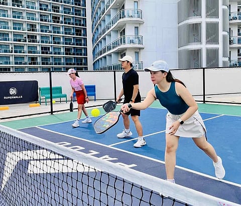 Pickleball action heats up during a free pickleball clinic at SM City Bicutan.
