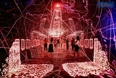 Guests take selfies and engage with various interactive displays at the newly opened Space and Time Cube+ immersive art museum at SM City North Edsa in Quezon City on Saturday, 17 May 2025.