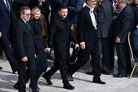 Ukraine's President Volodymyr Zelensky (2ndR) and his wife Elena arrive to attend a Holy Mass for the Beginning of the Pontificate of Pope Leo XIV, in St Peter's square in The Vatican on May 18, 2025.