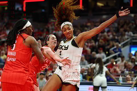 CAITLIN Clark (left) and Angel Reese are the subject of a WNBA investigation following their shoving match during the game between the Indiana Fever and the Chicago Sky.