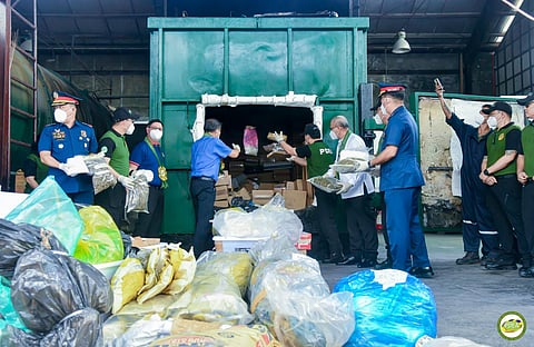 Up in smoke  Drugs are incinerated by PDEA Tuesday in a Trece Martires, Cavite narcotics disposal facility.