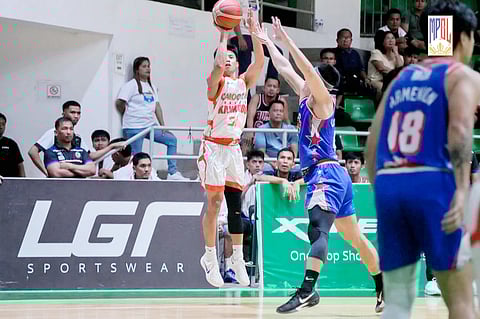 JEFF Manday of Caloocan shoots over John Lloyd Clemente of Pampanga during their MPBL Season 2025 game last Monday. The Batang Kankaloo prevailed, 90-87.   