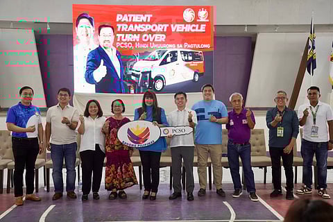 PCSO officials and local leaders pose during the turnover ceremony of seven patient transport vehicles to Davao Oriental LGUs, held at the provincial capitol in Mati on 6 May 2025.