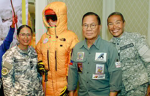 Philippine Coast Guard Commander Carina Dayondon and Petty Officer First Class Noelle Wenceslao Penetrante reunite with former expedition leader Art Valdez during the launch of Live the Dream 2 on 17 May.