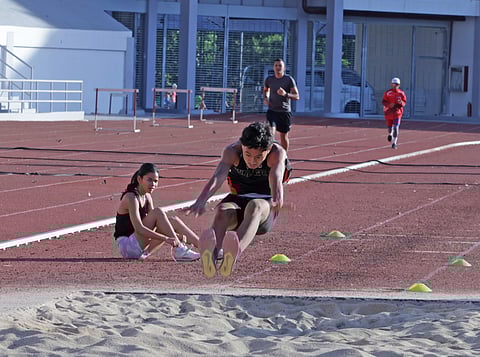 Long jumper Khianne Marx Manicad of Region 4-A skies in a practice jump at the Ferdinand Edralin  Marcos Memorial Stadium ahead of the 65th Palarong Pambansa in Laoag City, Ilocos Norte.