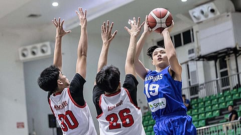 JUSTIN Hallare shoots over a Vietnamese defender to help Gilas Pilipinas Youth notch a 113-62 win in the opener of the FIBA Asia Cup U16 SEABA Qualifiers late Saturday.