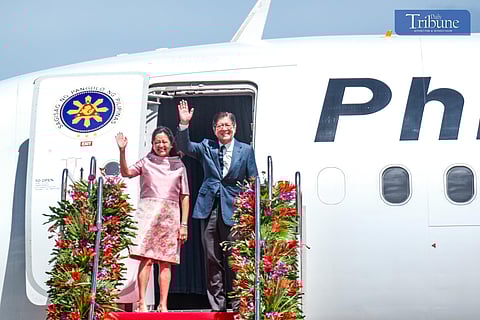 PRESIDENT Ferdinand R. Marcos Jr. and  First Lady Liza Araneta-Marcos wave to well-wishers before flying for Kuala Lumpur, Malaysia. 
