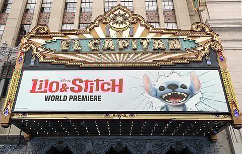 (FILES) The marquee is seen during the world premiere of Disney’s live action remake of "Lilo & Stitch" at the El Capitan theatre in Hollywood, California, May 17, 2025. Theaters across North America are enjoying an exceptional Memorial Day holiday weekend, with two new much-anticipated blockbusters bringing in an estimated box office totaling well over $250 million, analysts said on May 25, 2025.
