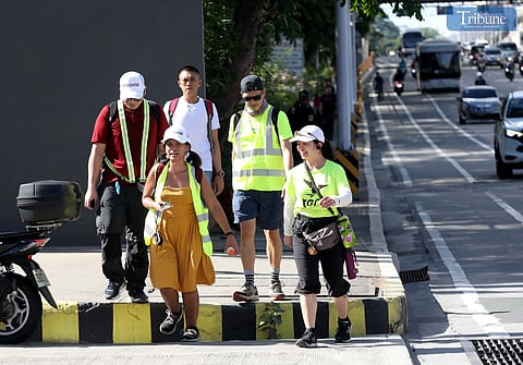 Members of the Move as One Coalition stage a #MayTaoPoSaEDSA walk on the northbound lane of EDSA , which covers a 22-kilometer stretch from One Ayala Telus in Makati City to the Caloocan City People’s Park. The "EDSA Walk" aims to reclaiming the sidewalk for the pedestrians. 26 May, Monday I Photo for the Daily Tribune by Analy Labor
