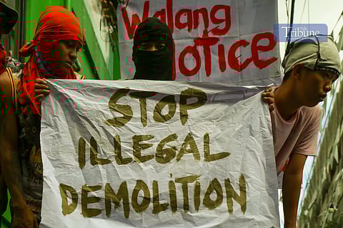 Residents of Barangay 264 in Mayhaligue, Tondo, Manila barricaded their compound gate on the morning of 26 May 2025 as a demolition team moved in to enforce a court order.