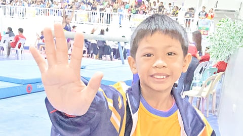 NCR gymnast Armand Hernandez Jr. puts on a big smile after grabbing five gold medals in the 65th Palarong Pambansa in Laoag, Ilocos Norte.