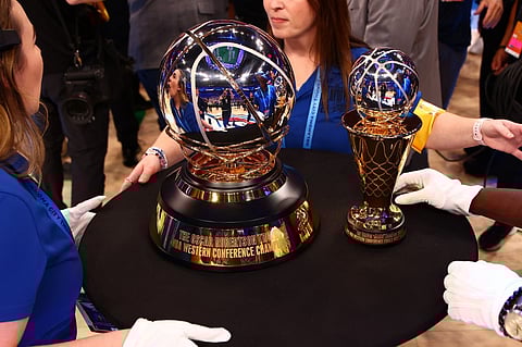 OSCAR Robertson Western Conference Champion trophy & the Earvin "Magic" Johnson Trophy for the NBA Western Conference Finals Most Valuable Player Award after the game during Game Five of the Western Conference Finals on 28 May 2025 at Paycom Center in Oklahoma City, Oklahoma.