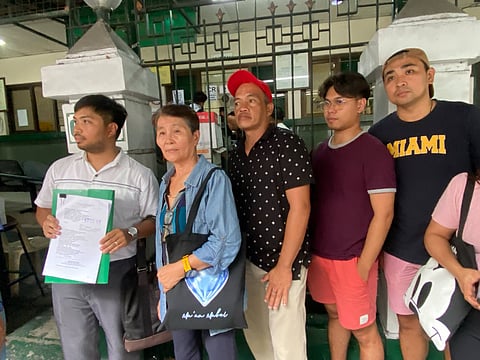 NASUGBU agrarian reform beneficiaries lawyer, Irvyn Longno (leftmost), shows the copy of the Urgent Petition for Certiorari and with Prayer for Injunction/TRO when they thronged the Court of Appeals in Manila on Friday, seeking the appellate court to nullify and void the Consolidated Order released by DAR Sec. Conrado Estrella last 2024, an issued order that will evict thousands of residents in three barangays of Nasugbu, Batangas. The said land was repossessed by the publicly-listed firm, Roxas and Company, Inc.   