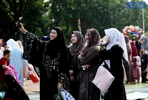 [FILE PHOTO] MUSLIM brothers and sisters take a selfie after offering prayers during the celebration of Eid al-Adha at Quezon Memorial Circle in Quezon City on Friday, 6 June 2025.

On 18 June, President Ferdinand Marcos Jr. has signed Republic Act No. 12224, declaring the first day of February as the “National Day of Awareness on Hijab and other traditional garments and attire.