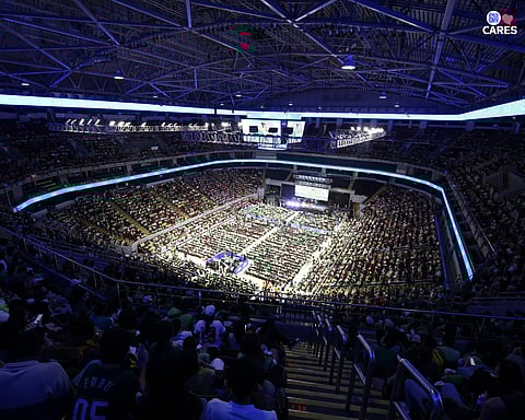 PARTICIPANTS to the Angels Walk for Autism event pack the SM MOA Arena (left). Solar panel rooftop at the SM City Sta. Rosa in Laguna.