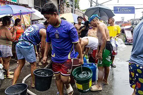 Residents queue for free water rations distributed by the Manila Disaster Risk Reduction and Management Office in Barangay 105, Tondo, Manila, on Sunday, 8 June 2025. 

The emergency supply was deployed after a sudden service interruption caused by a contractor accidentally damaging a 2.2-meter Maynilad trunkline during excavation for the Pritil Market Project. About 350,000 customers in Manila, Pasay, Parañaque, Las Piñas, and parts of Cavite remain affected as repair work continues.