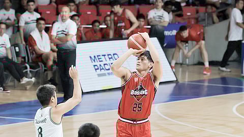 Christian David fires 19 points and grabs 12 rebounds to lift Blackwater past Terrafirma in their PBA Philippine Cup game Sunday at the Ninoy Aquino Stadium.