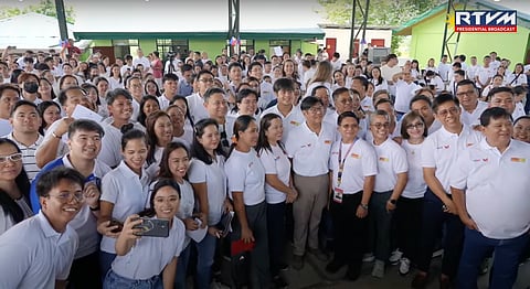 PRESIDENT Ferdinand Marcos Jr. poses for a photo with new public school teachers at the Tibagan Elementary School in San Miguel, Bulacan. Marcos said he considers teachers as 'heroes' going above and beyond their duties just to help their students.