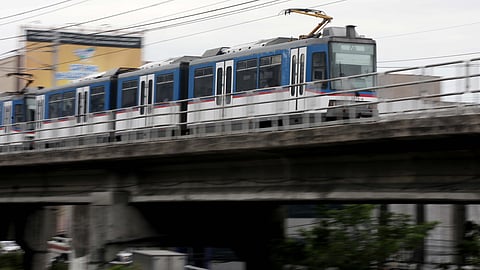 A Metro Rail Transit Line 3 (MRT-3) train travels along EDSA in Quezon City on Tuesday, 10 June 2025. The Department of Transportation (DOTr) announced that the MRT-3 will offer free rides on 12 June, in celebration of the 127th Philippine Independence Day. Free rides will be available from 7 AM to 9 AM and 5 PM to 7 PM