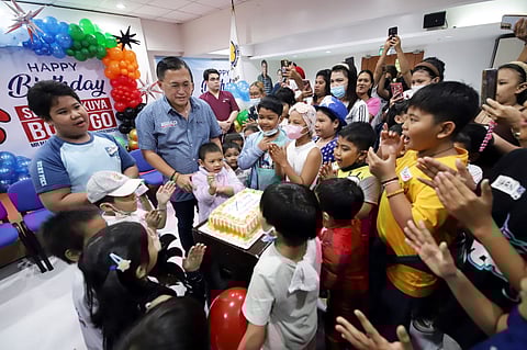 SENATOR Bong Go, joined by hospital staff and supporters, shares a light moment with young cancer patients during a visit to the Philippine Children’s Medical Center in Quezon City on 12 June 2025, as part of his annual birthday tradition.