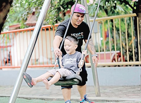 CHRISTIAN Gotladera spends a day at Quezon Memorial Circle with one of his three children on Saturday, ahead of Father’s Day.