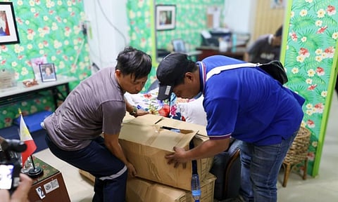 INDIVIDUALS carry boxes of donated school supplies during the distribution led by the Manila International Airport Authority in participation of the Brigada Eskwela 2025. 