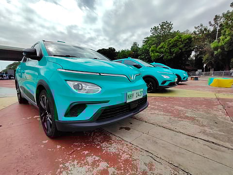 GREEN GSM’s fleet of VinFast Nerio EVs stands ready in their signature cyan color.