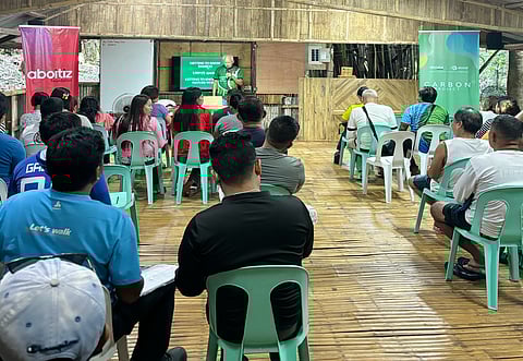 PARTICIPANTS listen to a lecture on hands-on bamboo propagation techniques during the community-based training at Kabilin Nature Farm in Balamban — part of Aboitiz Foundation’s efforts to restore the Mananga River riparian zone under the CarbonPH program.