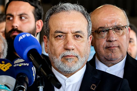 Iran's Foreign Minister Abbas Araghchi (C) gives a statement during his visit to the mausoleum of slain Lebanese Hezbollah's Leader Hassan Nasrallah, who was killed in an Israeli air strike in September 2024, in Beirut's southern suburbs on 3 June 2025.

