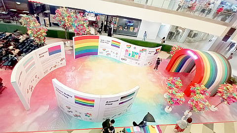 Informative panels on LGBTIQ+ flags at the mall’s activity area.